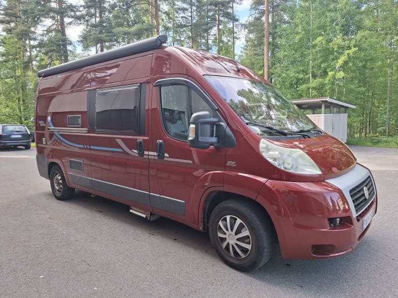 Peltiteltta, Juha:n Matkailuauto – Heinola