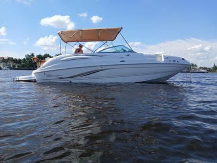 Spend a relaxing day with family and friends on the water seeing the sights on a 26' Chaparral deck boat – Fort Lauderdale